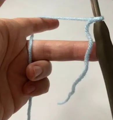 holding the working yarn